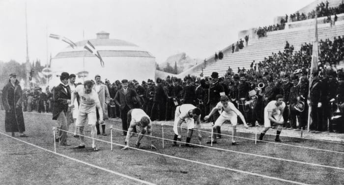 An early event in Greece: the 100 meters, won by a Bostonian, Thomas Burke.
